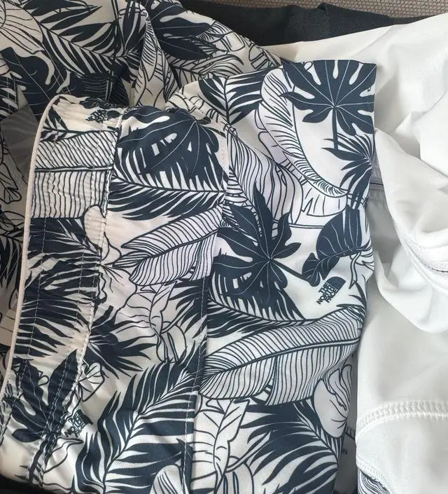 W'S WAVEY WRAP SKIRT - 노스페이스